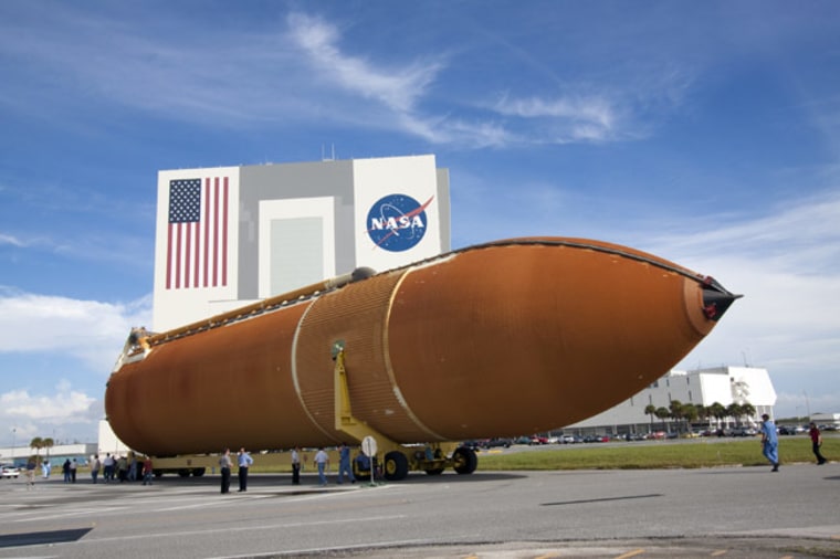 The external fuel tank for the space shuttle's Endeavour mission, scheduled to launch Feb. 27, 2011, was rolled into the Vehicle Assembly Building at NASA's Kennedy Space Center in Florida Tuesday, Sept. 28, 2010.